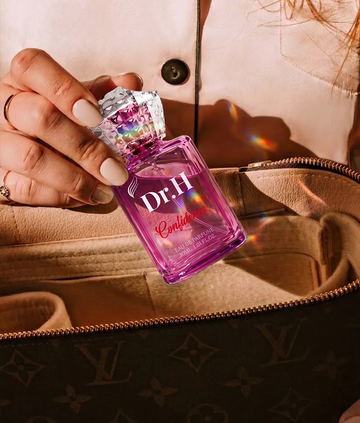 Dr.H Confidence women's Eau de Parfum with elegant magnolia and rose petals, creating a soft and graceful floral scent